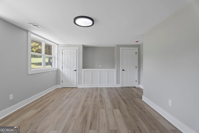 2604 Flat Shoals Rd SW, Conyers, GA 30094 - spare room with light wood finished floors and baseboards