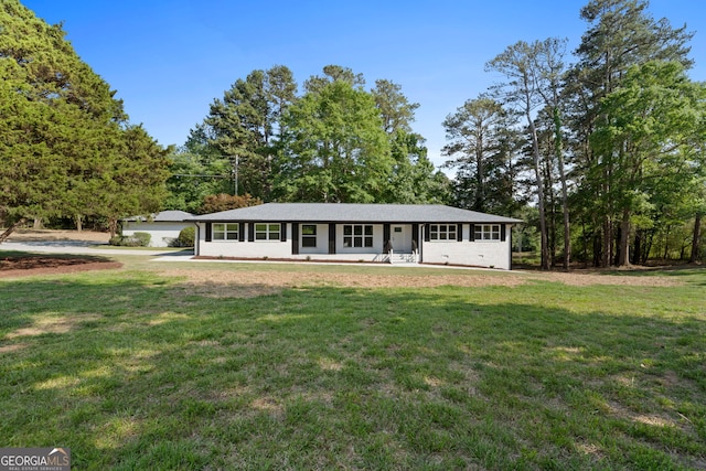 2604 Flat Shoals Rd SW, Conyers, GA 30094 - ranch-style home with a front yard