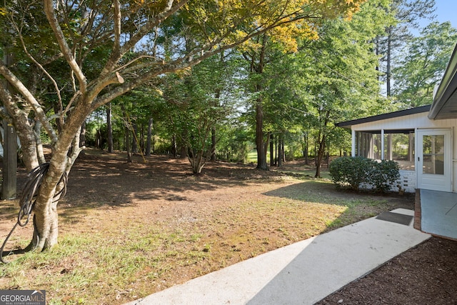 2604 Flat Shoals Rd SW, Conyers, GA 30094 - view of yard with a sunroom