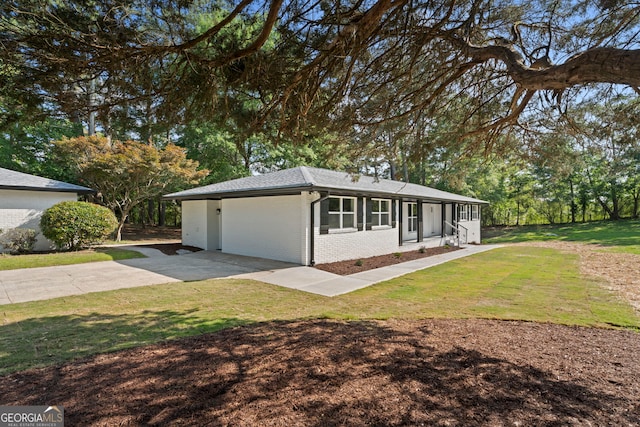 2604 Flat Shoals Rd SW, Conyers, GA 30094 - ranch-style house featuring brick siding and a front yard