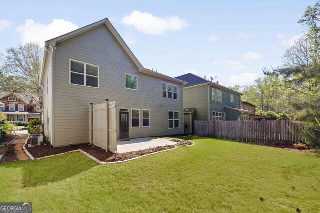 back of house with a patio area and cooling unit