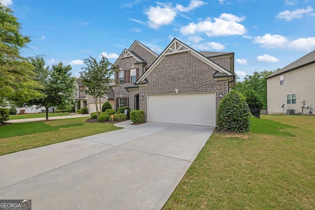 4050 Pleasant Woods Dr, Cumming, GA 30028 - view of front of property with brick siding, driveway, a front lawn, and a garage