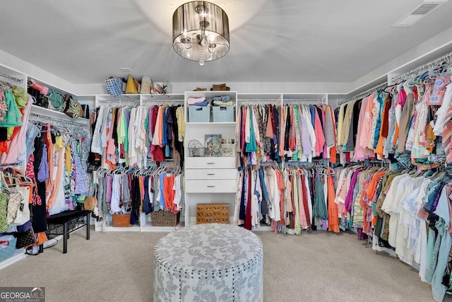 4050 Pleasant Woods Dr, Cumming, GA 30028 - spacious closet featuring carpet floors and a chandelier