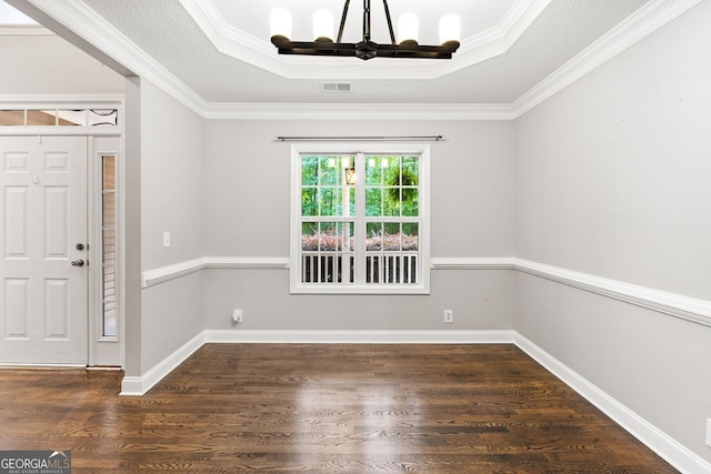 84 Creekside Ct, Zebulon, GA 30295 - foyer entrance featuring a chandelier, wood finished floors, a tray ceiling, crown molding, and baseboards