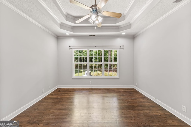 84 Creekside Ct, Zebulon, GA 30295 - empty room with wood finished floors, a textured ceiling, ornamental molding, ceiling fan, and a raised ceiling