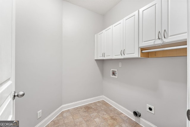 84 Creekside Ct, Zebulon, GA 30295 - washroom featuring cabinet space, hookup for a washing machine, electric dryer hookup, baseboards, and a textured ceiling