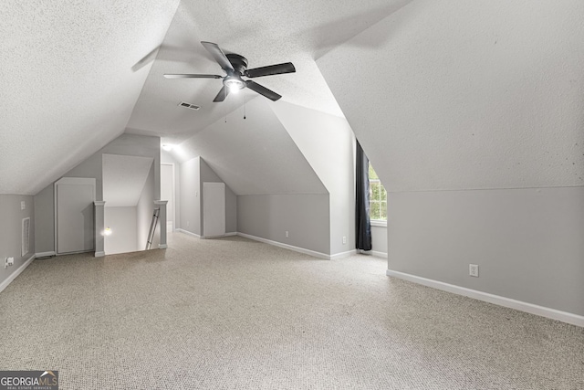 84 Creekside Ct, Zebulon, GA 30295 - bonus room with a textured ceiling, baseboards, ceiling fan, vaulted ceiling, and carpet flooring