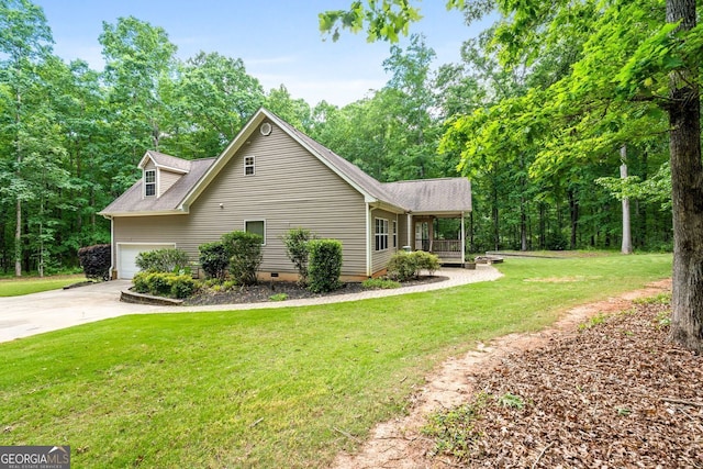 84 Creekside Ct, Zebulon, GA 30295 - view of side of property featuring a yard, a garage, crawl space, concrete driveway, and a porch