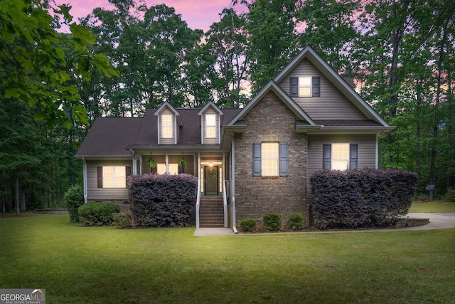 84 Creekside Ct, Zebulon, GA 30295 - view of front facade with a front yard and brick siding