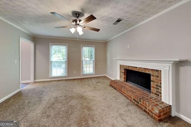 unfurnished living room featuring crown molding, carpet, a ceiling fan, a fireplace, and baseboards