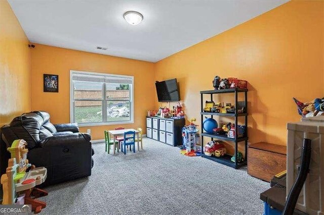 380 Longwood Pl, Dallas, GA 30132 - living area with carpet flooring and baseboards
