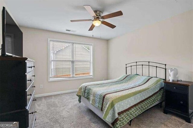 380 Longwood Pl, Dallas, GA 30132 - bedroom with carpet floors, baseboards, and ceiling fan