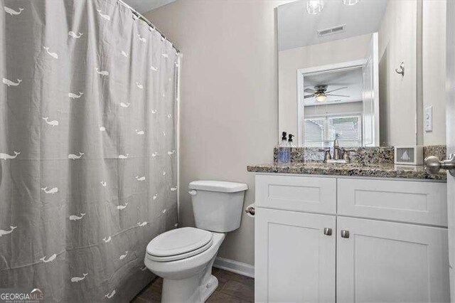 380 Longwood Pl, Dallas, GA 30132 - full bath featuring toilet, vanity, a ceiling fan, baseboards, and a shower with curtain