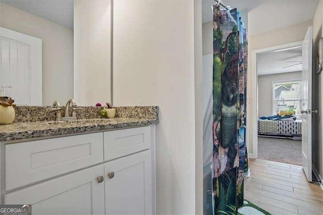 380 Longwood Pl, Dallas, GA 30132 - full bath featuring vanity, wood finished floors, and ensuite bathroom