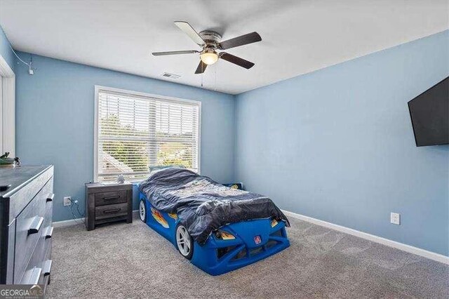 380 Longwood Pl, Dallas, GA 30132 - bedroom featuring light colored carpet, baseboards, and a ceiling fan