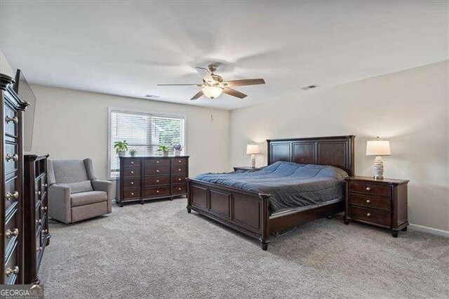 380 Longwood Pl, Dallas, GA 30132 - bedroom featuring light colored carpet, a ceiling fan, and baseboards