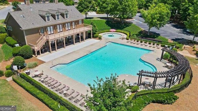 380 Longwood Pl, Dallas, GA 30132 - community pool with stairs, a patio area, and a hot tub