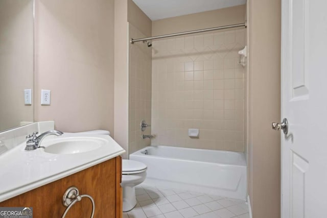 full bath with tile patterned floors, toilet, vanity, and shower / washtub combination