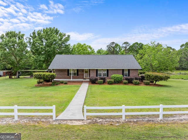 233 Clark Rd, Midville, GA 30441 - ranch-style house featuring a porch and brick siding