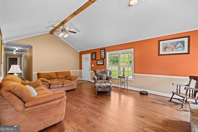233 Clark Rd, Midville, GA 30441 - living area with ornamental molding, wood finished floors, ceiling fan, and baseboards