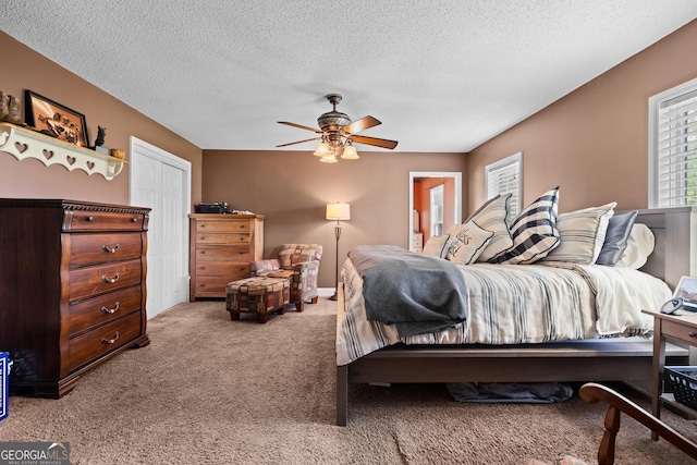 233 Clark Rd, Midville, GA 30441 - carpeted bedroom featuring a textured ceiling and ceiling fan
