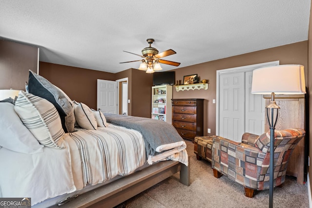 233 Clark Rd, Midville, GA 30441 - carpeted bedroom with ceiling fan and a textured ceiling