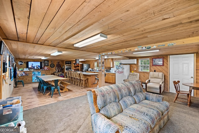 233 Clark Rd, Midville, GA 30441 - living area with light colored carpet, wood walls, wood ceiling, and a bar