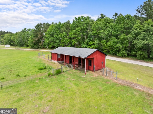 233 Clark Rd, Midville, GA 30441 - view of outdoor structure featuring an exterior structure, an outdoor structure, and a view of trees