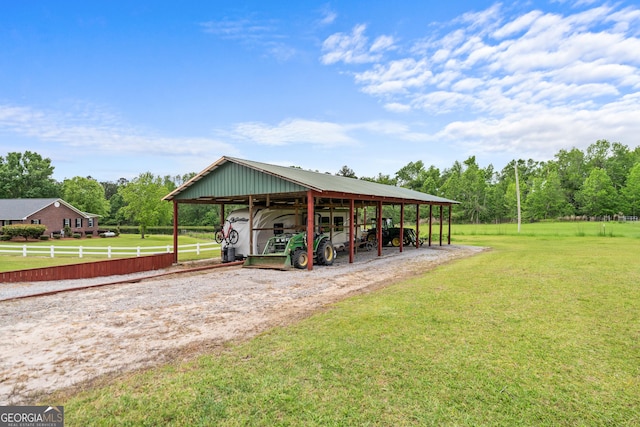 233 Clark Rd, Midville, GA 30441 - view of parking featuring a detached carport and dirt driveway
