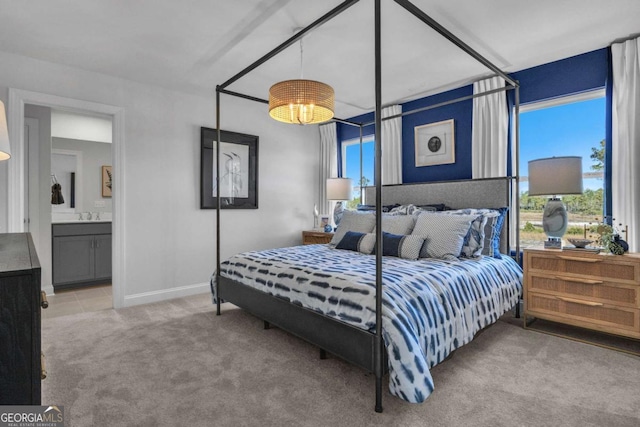 508 Regency Trl, Acworth, GA 30102 - bedroom with carpet, multiple windows, a sink, and baseboards