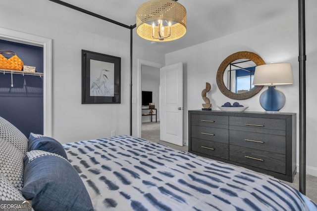 508 Regency Trl, Acworth, GA 30102 - bedroom featuring carpet, a chandelier, and baseboards