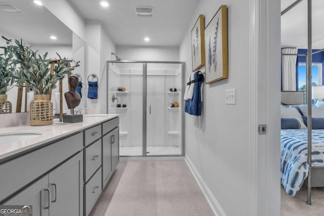 508 Regency Trl, Acworth, GA 30102 - ensuite bathroom with baseboards, a stall shower, double vanity, recessed lighting, and tile patterned floors