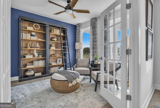 508 Regency Trl, Acworth, GA 30102 - sitting room featuring baseboards, ceiling fan, and wood finished floors