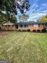 1838 Cates Ct, Snellville, GA 30078 - ranch-style house with a front lawn