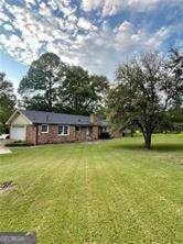 1838 Cates Ct, Snellville, GA 30078 - view of grassy yard