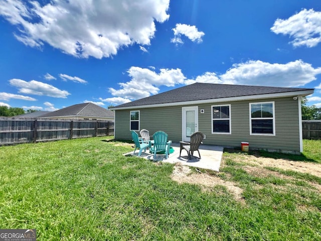 rear view of property with a patio