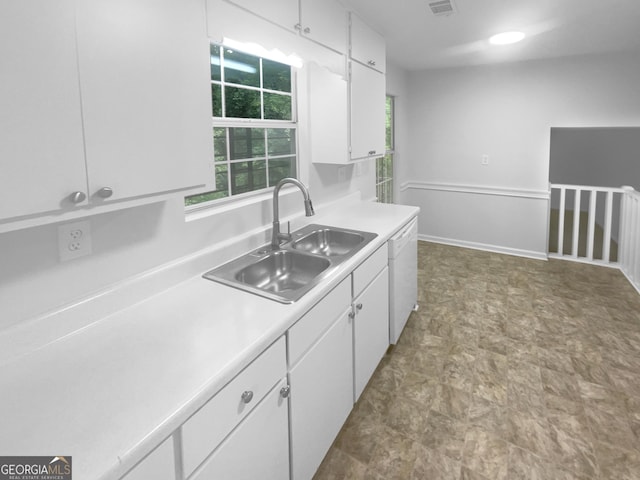 4504 Cedar Ridge Trl, Stone Mountain, GA 30083 - kitchen featuring a sink, white cabinetry, light countertops, and white dishwasher