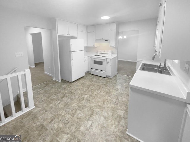 4504 Cedar Ridge Trl, Stone Mountain, GA 30083 - kitchen with white appliances, a sink, light flooring, and light countertops