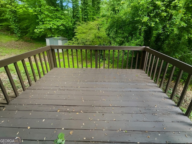 4504 Cedar Ridge Trl, Stone Mountain, GA 30083 - wooden deck with a shed and an outdoor structure