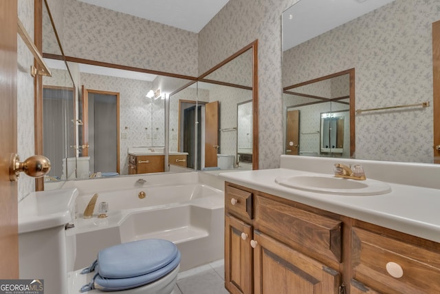 bathroom with wallpapered walls, a bath, tile patterned floors, toilet, and vanity