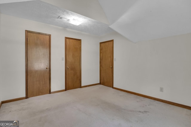bonus room featuring carpet floors and baseboards