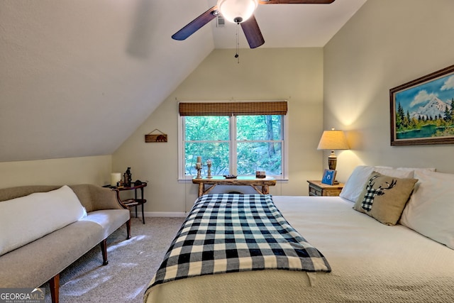 bedroom featuring carpet flooring, vaulted ceiling, ceiling fan, and baseboards