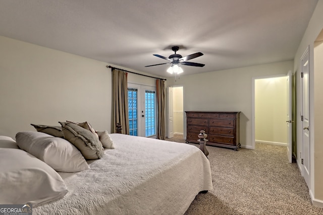 carpeted bedroom featuring access to exterior, baseboards, and ceiling fan