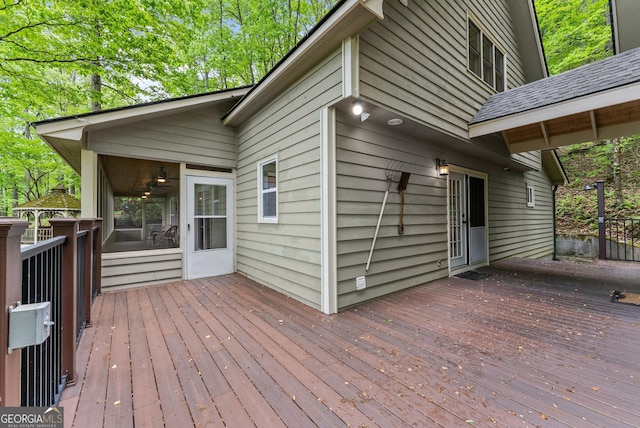 wooden terrace with a sunroom