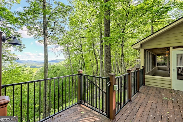 deck featuring a sunroom