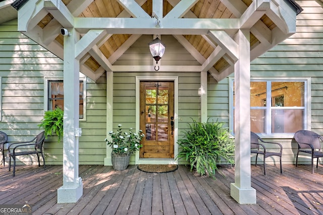 doorway to property featuring a deck