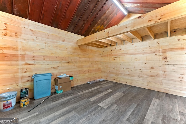 bonus room with dark wood-style floors, wooden walls, wood ceiling, and vaulted ceiling