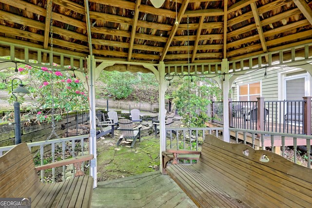 wooden deck featuring a gazebo