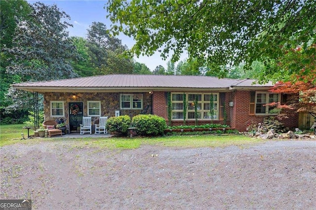 413 New Town Rd NE, Calhoun, GA 30701 - single story home with metal roof