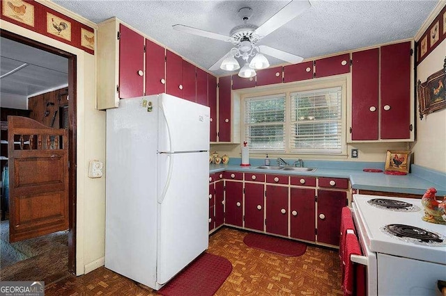 413 New Town Rd NE, Calhoun, GA 30701 - kitchen featuring red cabinetry, white appliances, a sink, a textured ceiling, and a ceiling fan